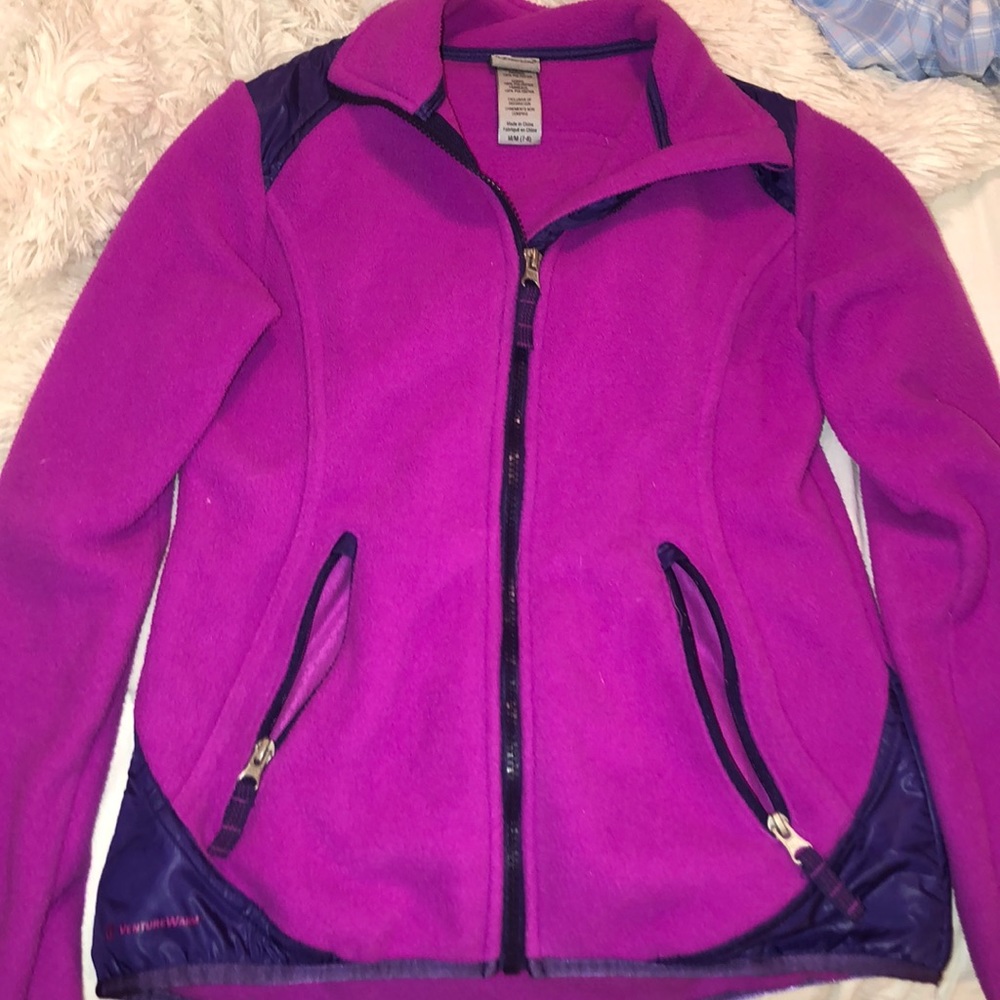 A dark and light purple zip up jacket